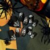 JP2511 Halloween Matte Black French Tip Press On Nails with Gothic Art Designs - 3D Skull Spider Web Haunted House Patterns Salon Quality Reusable Fake Nails DIY Kit for Women