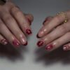JP3841-Effortless French Flair: Chic Red Tips with Petal Accents for Short Round Nails (Reusable & Waterproof)