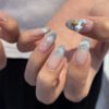 JP3641-Oceanic Dream Reusable Press-On Nails​​ Cat-Eye Blue Gradient French Tips with Floating Dolphins & Florals – Waterproof Spring Magic