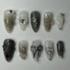 JP3399-Black Magic Rebellion: Reusable Gothic Ombré Almond Nails w/ 3D Bows & Silver Stars​​ Salon-Quality Edge Without the Commitment or Cost