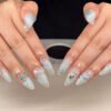 ​JP3335-Ocean Dream 3D French Almond Press-On Nails​​ New Watercolor Blue Ombré with Floating Hearts & Stars – Salon-Quality 3D Art in Minutes