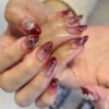 JP3030-Crimson Kiss Almond Press Ons | Spider & Heart Sweet Goth Nails (Reusable Waterproof)​​ ​​Subtitle:​​ Your Dark Valentine Manicure ❤️🕷️ Salon-Grade Edge in 8 Minutes – No Commitment, Maximum Attitude.  (Hero Image: Moody crimson nails with glitter spiders/hearts against crushed velvet, gripping vintage key)
