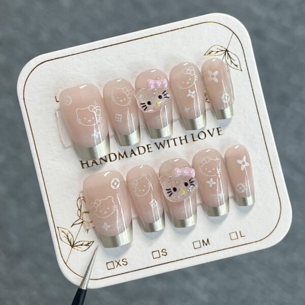 O1CN01ncnIyf2NGHuytMTQY_!!4234819935-0-cib SP168-Silvery Sparkle Magic: Cat Eye French Tips With Hello Kitty Charm - Instantly Glam ✨